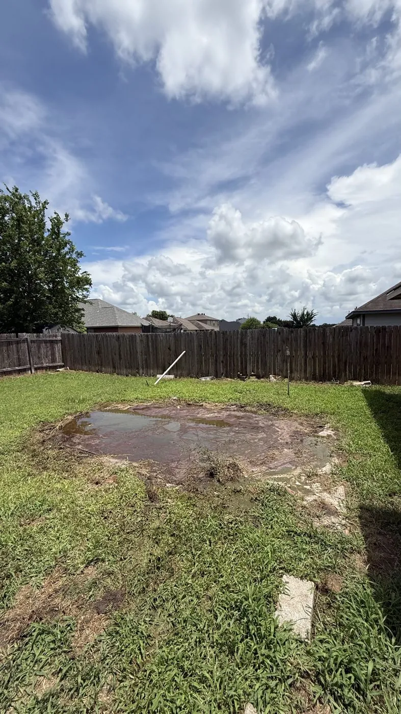 Backyard cleared after Aggie Haulers removed an old above-ground pool