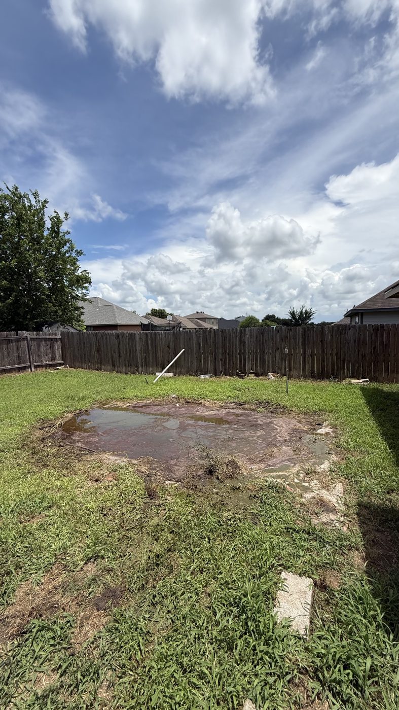 Backyard cleared after Aggie Haulers removed the above-ground pool